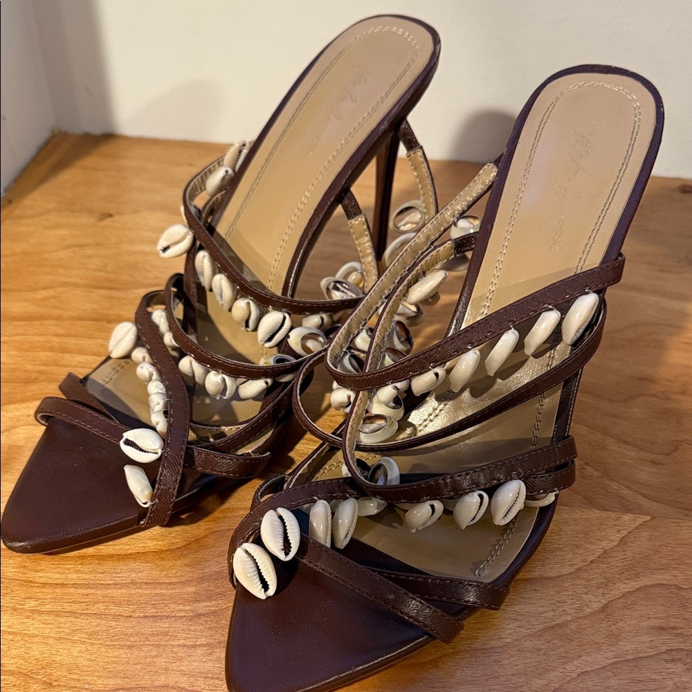 Téjahn Burnett (iyah) Brown Strappy Sandals with Cowrie Shell Accents